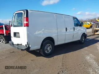 2014 Chevrolet Express Cargo Van with VIN 1GCWGFCA2E1148147, listed as a IAAI auction lot 41101132 with 110,648 mi miles. Bid and sale history available at carsss.com. Image 4.