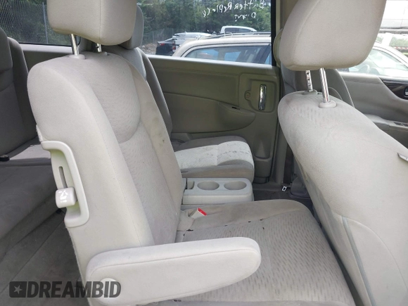 2014 Nissan Quest S with VIN JN8AE2KP5E9103563, listed as a IAAI auction lot 42223702 with 93,373 mi miles and . Bid and sale history available at DreamBid. Image 8.