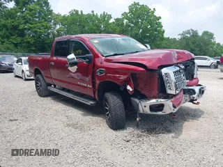 2016 Nissan Titan Platinum Reserve with VIN 1N6BA1F44GN501411, listed as a IAAI auction lot 42410999 with 149,277 mi miles and . Bid and sale history available at DreamBid. Image 1.