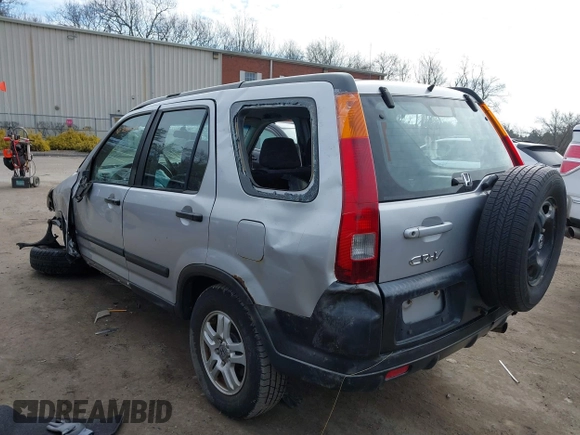 2002 Honda CR-V LX z VIN JHLRD78532C050707, wystawiony jako IAAI lot #41704967 z przebiegiem 306 564 mil mil oraz . Historia ofert i sprzedaży dostępna na DreamBid. Obrazek 3.