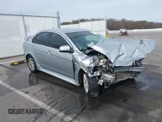 2010 Mitsubishi Lancer ES with VIN JA32U2FU4AU031599, listed as a IAAI auction lot 40817823 with 127,034 mi miles. Bid and sale history available at carsss.com. Image 1.