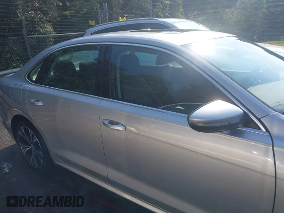 2021 Volkswagen Passat SE with VIN 1VWSA7A38MC012907, listed as a IAAI auction lot 42581889 with 76,001 mi miles and . Bid and sale history available at DreamBid. Image 14.