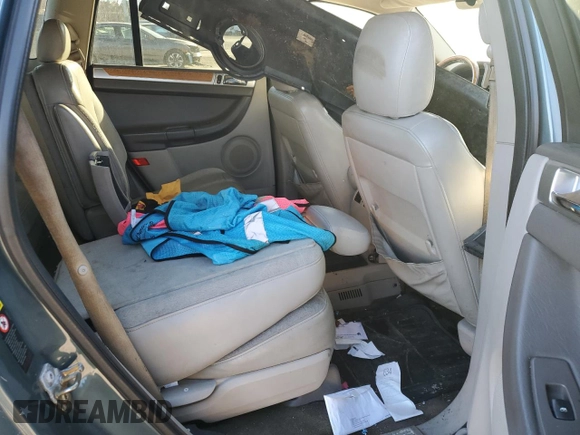 2005 Chrysler Pacifica z VIN 2C8GF78405R471204, wystawiony jako Copart lot #79471964 z przebiegiem Nie podano mil oraz Szkoda całkowita • Salvage title. Historia ofert i sprzedaży dostępna na DreamBid. Obrazek 10.