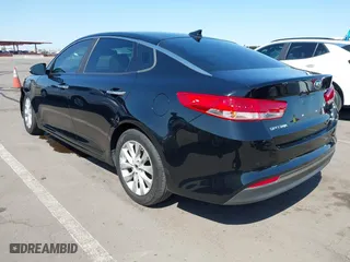 2016 Kia Optima EX with VIN 5XXGU4L38GG032056, listed as a IAAI auction lot 42013867 with 145,466 mi miles. Bid and sale history available at carsss.com. Image 3.