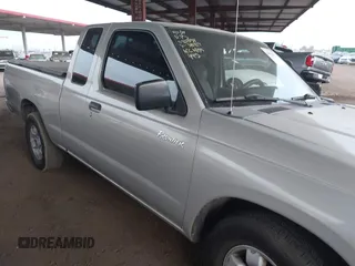 1999 Nissan Frontier XE z VIN 1N6DD26S3XC340419, wystawiony jako IAAI lot #40964630 z przebiegiem 156 431 mil mil oraz . Historia ofert i sprzedaży dostępna na DreamBid. Obrazek 13.