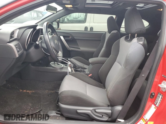 2014 Scion tC z VIN JTKJF5C77E3075236, wystawiony jako Copart lot #47632495 z przebiegiem 134 825 mil mil oraz Szkody całkowita. Historia ofert i sprzedaży dostępna na DreamBid. Obrazek 7.