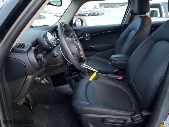 2019 MINI Hardtop 4 Door Cooper with VIN WMWXU1C54K2J03247, listed as a Copart auction lot 87318144 with 33,949 mi miles and Salvage Title. Bid and sale history available at carsss.com. Image 7.