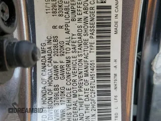 2020 Honda Civic LX z VIN 2HGFC2F67LH514051, wystawiony jako Copart lot #58304235 z przebiegiem 60 765 mil mil oraz Szkoda całkowita • Salvage title. Historia ofert i sprzedaży dostępna na DreamBid. Obrazek 12.