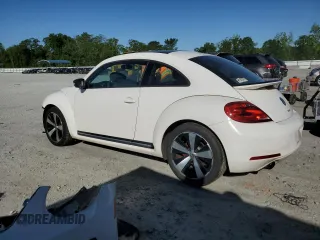2012 Volkswagen Beetle 2.0T Turbo w/Sun/Snd/Nav PZEV with VIN 3VWVA7AT7CM631038, listed as a Copart auction lot 50749973 with 75,581 mi miles and Salvage Title. Bid and sale history available at carsss.com. Image 2.