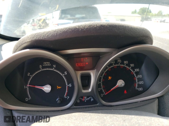 2012 Ford Fiesta SE z VIN 3FADP4BJ5CM195837, wystawiony jako Copart lot #57363165 z przebiegiem 108 003 mil mil oraz Szkoda całkowita • Salvage title. Historia ofert i sprzedaży dostępna na DreamBid. Obrazek 9.