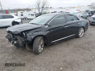 2014 Cadillac XTS Luxury with VIN 2G61M5S36E9248122, listed as a IAAI auction lot 42012167 with 188,458 mi miles and . Bid and sale history available at DreamBid. Image 16.