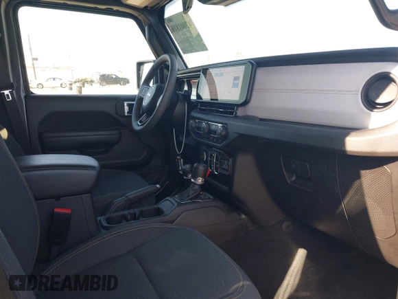 2024 Jeep Wrangler Sport S with VIN 1C4RJXN61RW192386, listed as a IAAI auction lot 42001810 with 7,426 mi miles and . Bid and sale history available at DreamBid. Image 5.