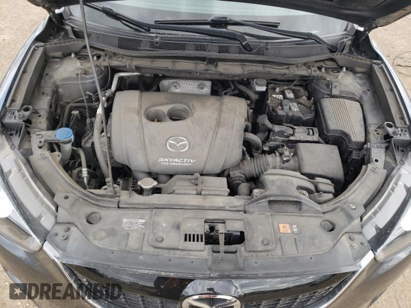 2015 Mazda CX-5 Grand Touring with VIN JM3KE4DY2F0526535, listed as a Copart auction lot 53046855 with 90,288 mi miles and Salvage Title. Bid and sale history available at DreamBid. Image 11.