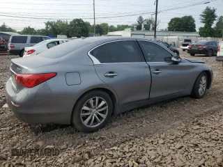 2015 Infiniti Q50 Premium with VIN JN1BV7ARXFM421115, listed as a Copart auction lot 60875545 with 84,549 mi miles and Salvage title. Bid and sale history available at DreamBid. Image 3.