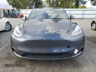 2021 Tesla Model Y Long Range with VIN 5YJYGDEE6MF200883, listed as a Copart auction lot 51707405 with 59,820 mi miles and Salvage Title. Bid and sale history available at DreamBid. Image 5.