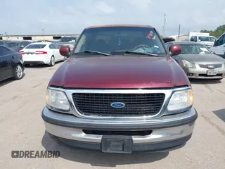 1997 Ford F-150 z VIN 1FTDX17W1VNB67040, wystawiony jako IAAI lot #41940240 z przebiegiem 99 816 mil mil oraz . Historia ofert i sprzedaży dostępna na DreamBid. Obrazek 6.