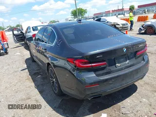 2021 BMW 5 Series 540i xDrive with VIN WBA73BJ02MWW93833, listed as a IAAI auction lot 42160043 with 59,779 mi miles and . Bid and sale history available at DreamBid. Image 3.