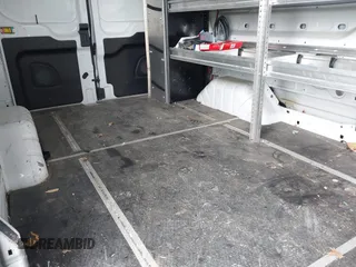 2020 Ford Transit Cargo z VIN 1FTBR2C85LKA15937, wystawiony jako IAAI lot #41673232 z przebiegiem 56 172 mil mil oraz . Historia ofert i sprzedaży dostępna na DreamBid. Obrazek 8.