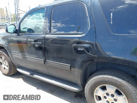 2013 Chevrolet Tahoe LS with VIN 1GNSCAE04DR104790, listed as a IAAI auction lot 42225652 with 119,948 mi miles and . Bid and sale history available at DreamBid. Image 14.
