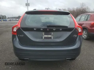 2015 Volvo V60 z VIN YV126MEA6F1206906, wystawiony jako Copart lot #51837425 z przebiegiem 142 194 mil mil oraz Tytuł czysty. Historia ofert i sprzedaży dostępna na DreamBid. Obrazek 6.