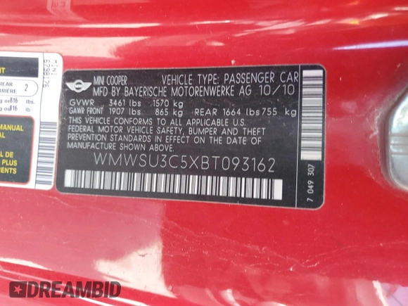 2011 MINI Hardtop z VIN WMWSU3C5XBT093162, wystawiony jako Copart lot #54871315 z przebiegiem 171 220 mil mil oraz Szkody całkowita. Historia ofert i sprzedaży dostępna na DreamBid. Obrazek 12.
