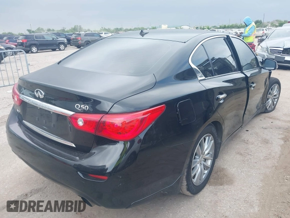 2015 Infiniti Q50 Premium with VIN JN1BV7AR6FM420057, listed as a IAAI auction lot 42045172 with 119,443 mi miles. Bid and sale history available at carsss.com. Image 4.