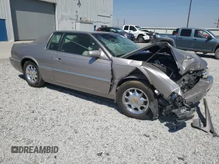 1996 Cadillac Eldorado z VIN 1G6EL12Y3TU618242, wystawiony jako Copart lot #70318844 z przebiegiem Nie podano mil oraz Szkody całkowita. Historia ofert i sprzedaży dostępna na DreamBid. Obrazek 4.