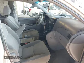 2005 Toyota Sienna LE with VIN 5TDBA23C75S046310, listed as a IAAI auction lot 42063973 with 127,509 mi miles. Bid and sale history available at carsss.com. Image 5.