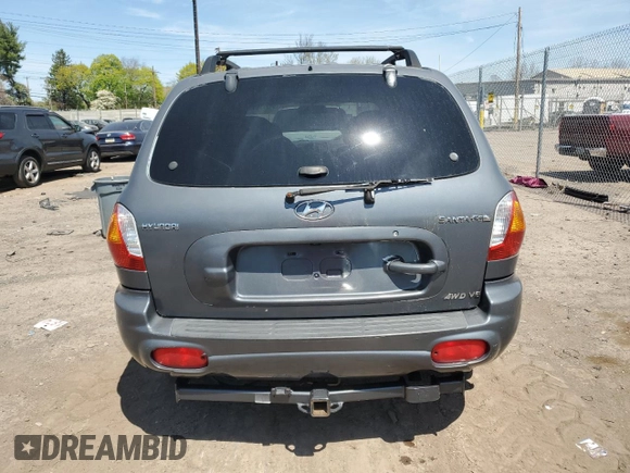 2001 Hyundai Santa Fe GLS with VIN KM8SC83D41U069325, listed as a Copart auction lot 54377815 with 51,574 mi miles and Clean Title. Bid and sale history available at carsss.com. Image 6.