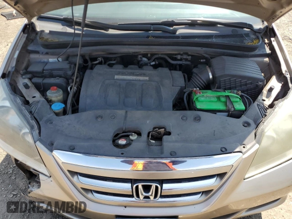 2006 Honda Odyssey EX-L z VIN 5FNRL38726B425098, wystawiony jako Copart lot #56143585 z przebiegiem 153 137 mil mil oraz Szkoda całkowita • Salvage title. Historia ofert i sprzedaży dostępna na DreamBid. Obrazek 12.