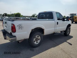 2011 Ford F-250 XL with VIN 1FTBF2B63BEB24712, listed as a Copart auction lot 65013145 with 176,681 mi miles and Salvage title. Bid and sale history available at DreamBid. Image 3.