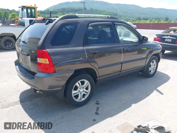 2005 Kia Sportage LX with VIN KNDJE723957075445, listed as a IAAI auction lot 42573760 with 185,000 mi miles and . Bid and sale history available at DreamBid. Image 4.