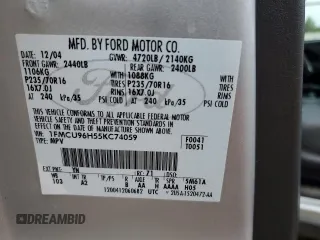 2005 Ford Escape Hybrid with VIN 1FMCU96H55KC74059, listed as a Copart auction lot 57065685 with 154,807 mi miles and Salvage title. Bid and sale history available at DreamBid. Image 13.