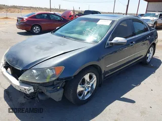 2005 Acura RL with VIN JH4KB16505C012679, listed as a IAAI auction lot 41976411 with 103,342 mi miles and . Bid and sale history available at DreamBid. Image 2.
