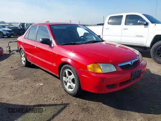 1999 Mazda Protege ES with VIN JM1BJ2210X0150191, listed as a IAAI auction lot 41577974 with 121,138 mi miles and . Bid and sale history available at DreamBid. Image 1.