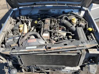 2000 Jeep Cherokee z VIN 1J4FF48S0YL142309, wystawiony jako Copart lot #46277785 z przebiegiem 148 966 mil mil oraz Nie do naprawy • Non repairable. Historia ofert i sprzedaży dostępna na DreamBid. Obrazek 11.