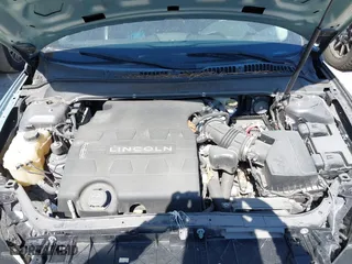 2014 Lincoln MKZ with VIN 3LN6L2GK9ER818561, listed as a IAAI auction lot 42063387 with 143,803 mi miles. Bid and sale history available at carsss.com. Image 10.