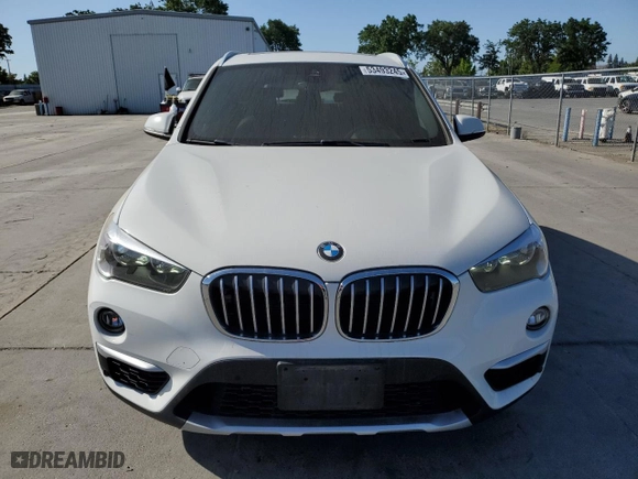 2019 BMW X1 xDrive28i with VIN WBXHT3C53K5L35670, listed as a Copart auction lot 53493245 with 14,201 mi miles and Salvage Title. Bid and sale history available at carsss.com. Image 5.