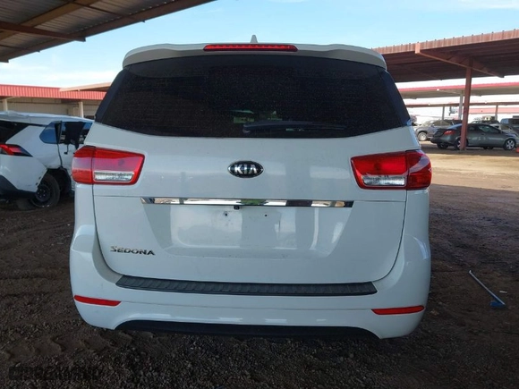 2018 Kia Sedona L with VIN KNDMA5C1XJ6398655, listed as a IAAI auction lot 41618294 with 94,712 mi miles. Bid and sale history available at carsss.com. Image 16.