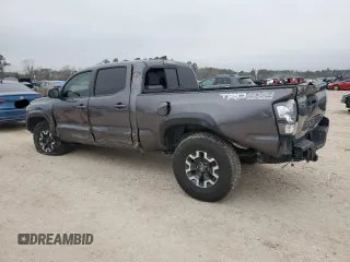 2021 Toyota Tacoma 4WD SR5 with VIN 5TFDZ5BN8MX062787, listed as a Copart auction lot 44987135 with 59,351 mi miles and Salvage Title. Bid and sale history available at carsss.com. Image 2.