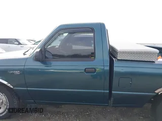 1997 Ford Ranger XLT z VIN 1FTCR10A6VUA47101, wystawiony jako IAAI lot #41743587 z przebiegiem 87 277 mil mil oraz . Historia ofert i sprzedaży dostępna na DreamBid. Obrazek 14.