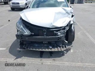 2019 Nissan Sentra S z VIN 3N1AB7AP6KY205658, wystawiony jako IAAI lot #42151392 z przebiegiem 80 395 mil mil oraz . Historia ofert i sprzedaży dostępna na DreamBid. Obrazek 6.