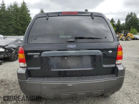 2005 Ford Escape XLT with VIN 1FMYU03165KB36801, listed as a Copart auction lot 61978705 with 217,658 mi miles and Salvage title. Bid and sale history available at DreamBid. Image 6.