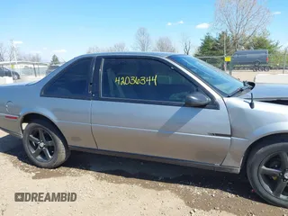 1995 Chevrolet Beretta z VIN 1G1LV15M5SY116047, wystawiony jako IAAI lot #42036344 z przebiegiem 104 222 mil mil oraz . Historia ofert i sprzedaży dostępna na DreamBid. Obrazek 13.