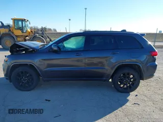 2017 Jeep Grand Cherokee Laredo with VIN 1C4RJFAG7HC769642, listed as a IAAI auction lot 41367874 with 128,095 mi miles. Bid and sale history available at carsss.com. Image 14.