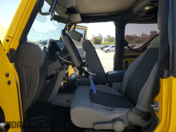 2008 Jeep Wrangler X with VIN 1J4FA24188L567678, listed as a Copart auction lot 60918635 with 185,368 mi miles and Salvage title. Bid and sale history available at DreamBid. Image 7.