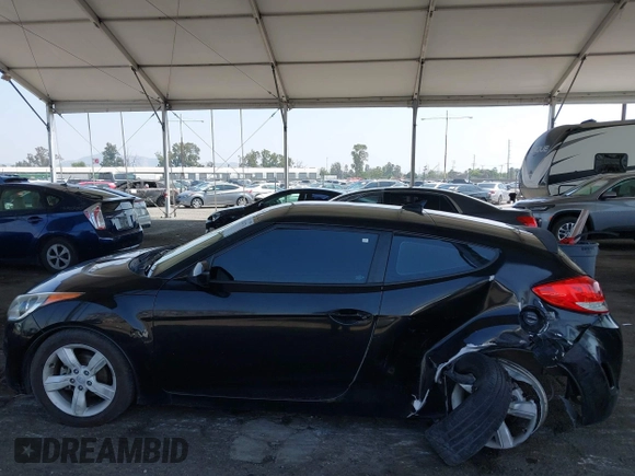 2013 Hyundai Veloster w/Black Int with VIN KMHTC6AD6DU088815, listed as a IAAI auction lot 42184776 with 204,930 mi miles and . Bid and sale history available at DreamBid. Image 14.