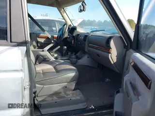 2002 Land Rover Discovery Cloth with VIN SALTY15462A765727, listed as a IAAI auction lot 41392404 with 141,132 mi miles and . Bid and sale history available at DreamBid. Image 5.