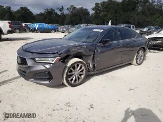 2021 Acura TLX with VIN 19UUB5F35MA010051, listed as a Copart auction lot 86976494 with 101,797 mi miles and Salvage Title. Bid and sale history available at carsss.com. Image 1.