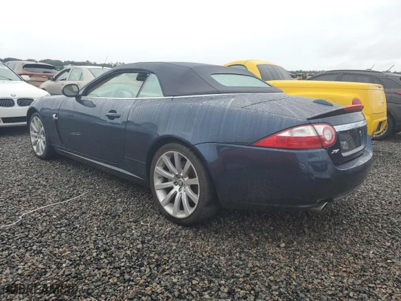 2007 Jaguar XK with VIN SAJDA44B075B03695, listed as a Copart auction lot 74978034 with 0 mi miles and Salvage Title. Bid and sale history available at carsss.com. Image 2.